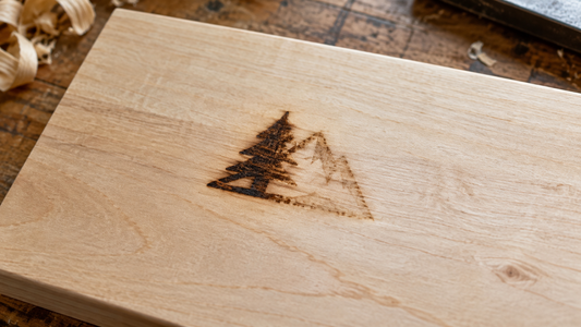 Illustrative photo of a heat-branded maker's mark dark on the left and faint on the right