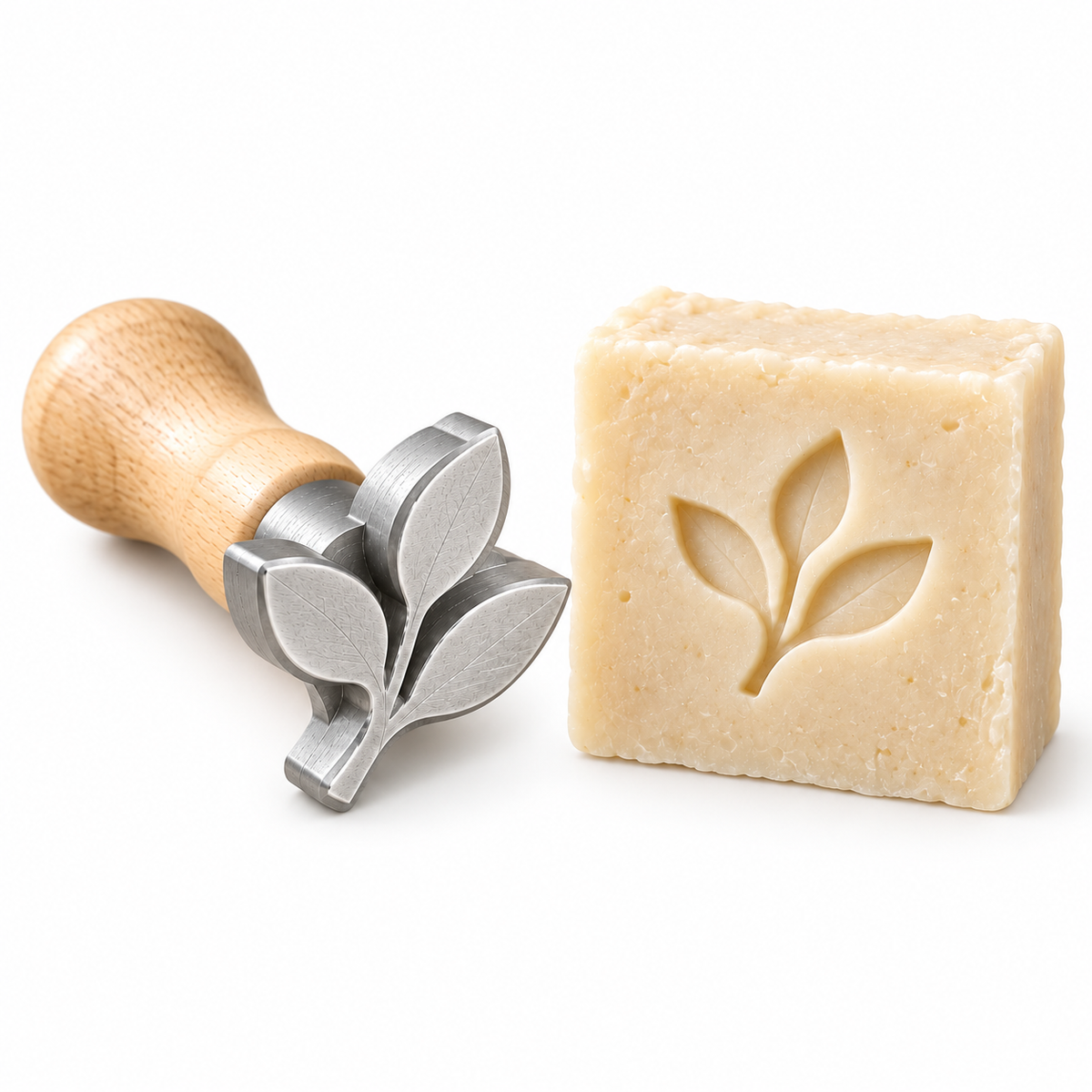 AI-generated concept of a wooden-handled aluminum soap stamp beside a stamped soap bar on white